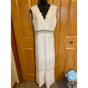 White floor length dress.